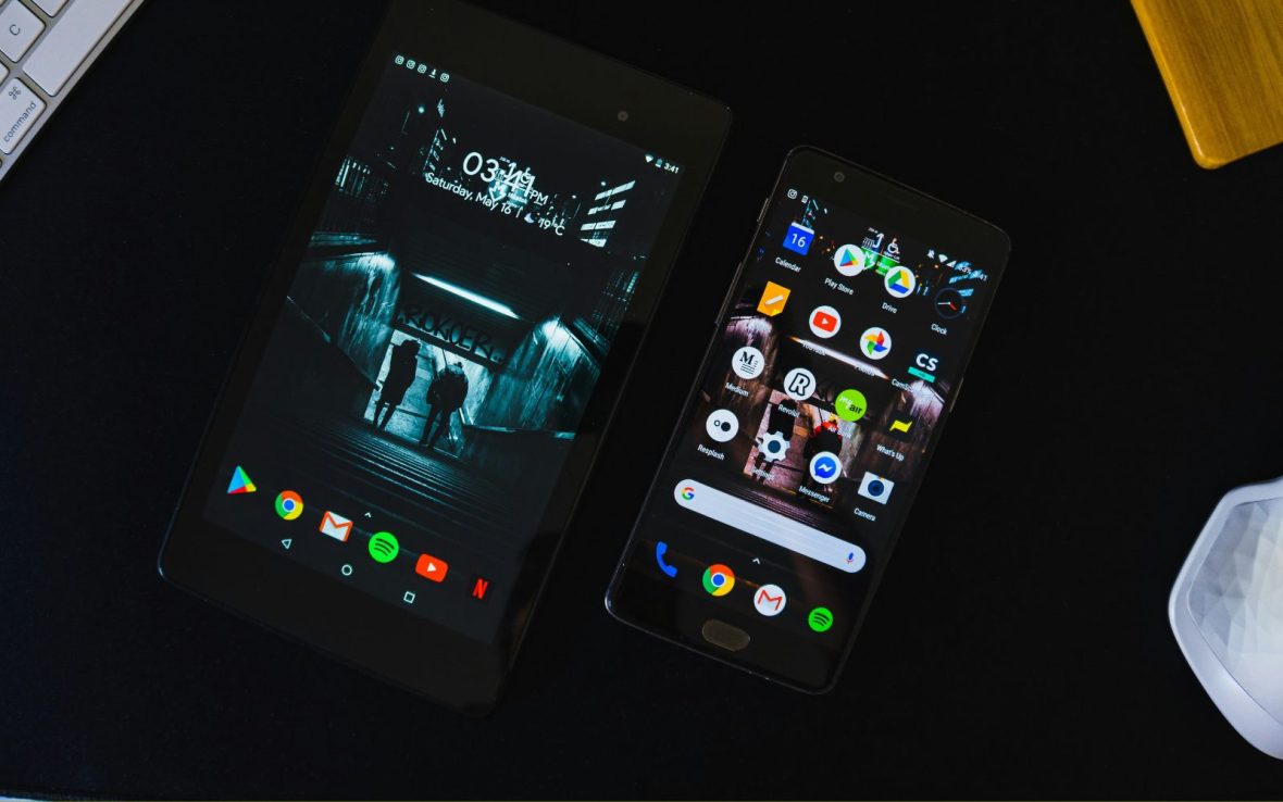 A close-up of a tablet and a mobile phone